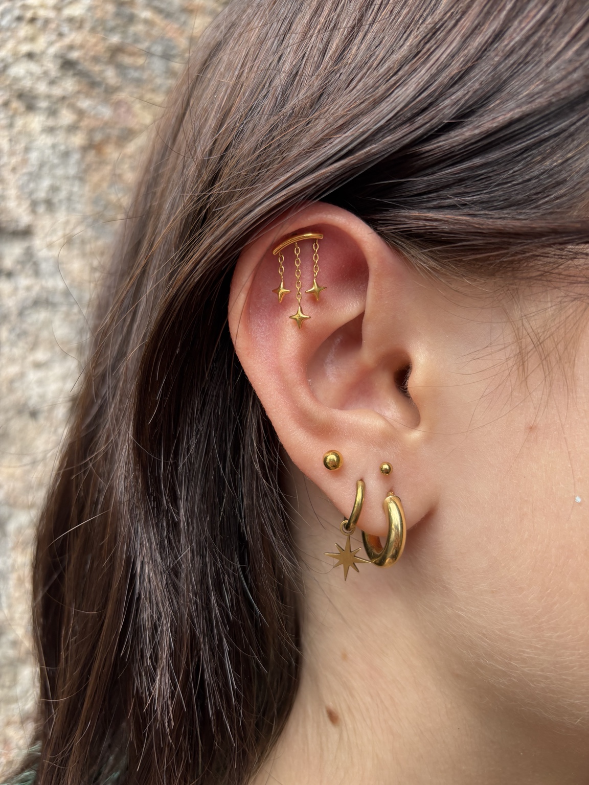 Piercing mit Sternschmuck